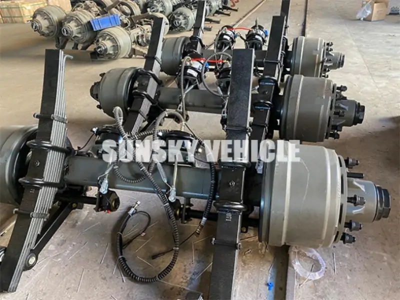 axle with spring rigid suspension